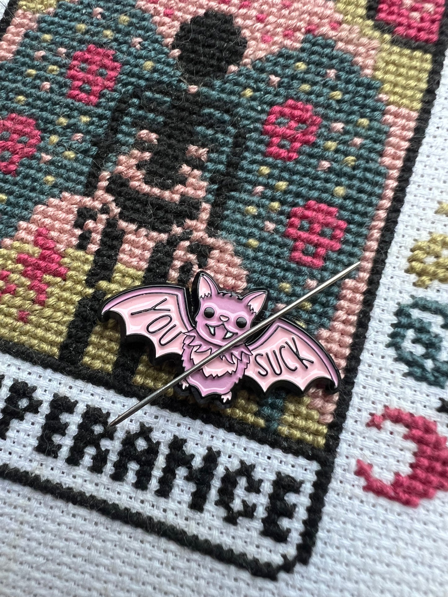 You Suck Bat magnetic needle minder