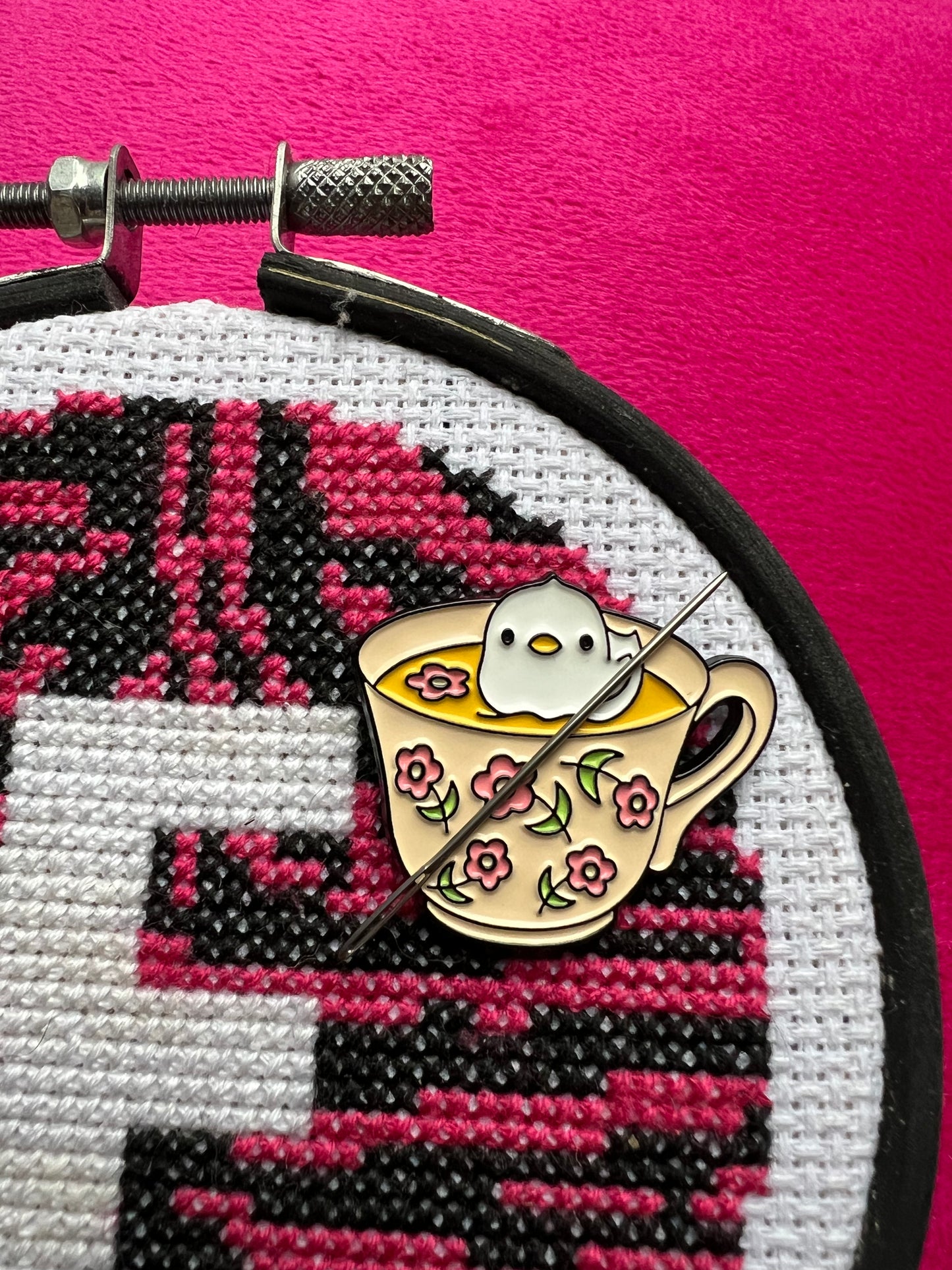 Chick in a cup magnetic needle minder