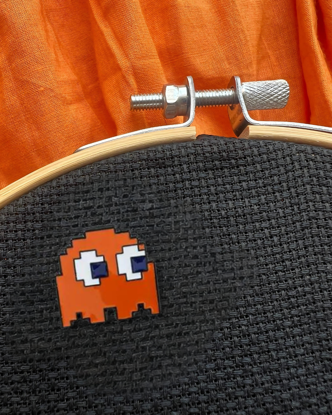 Pac-Man Orange Ghost needle minder