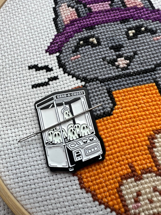Grab-a-Ghost glow in the dark magnetic needle minder