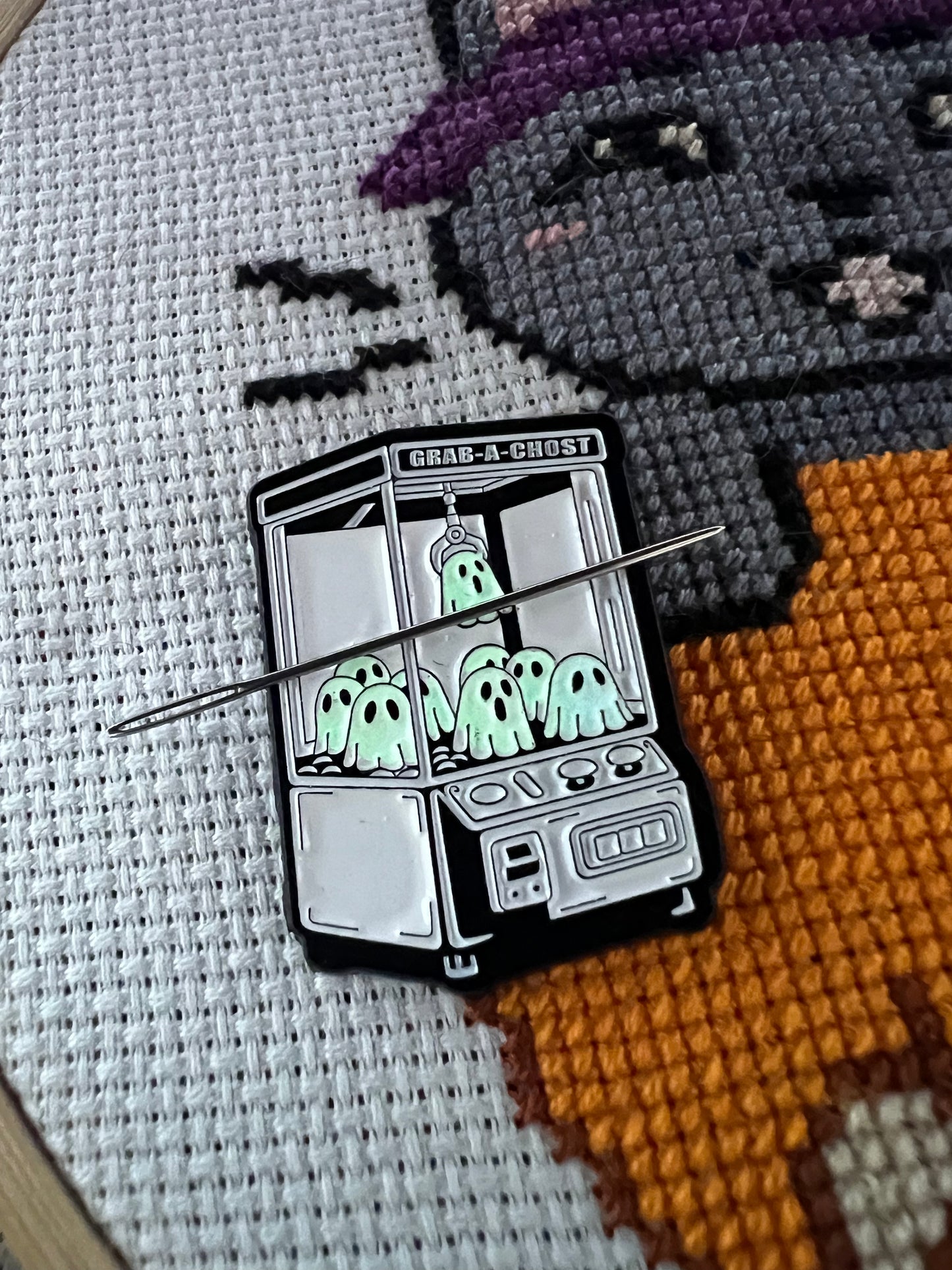 Grab-a-Ghost glow in the dark magnetic needle minder