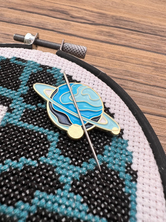 Blue planet magnetic needle minder