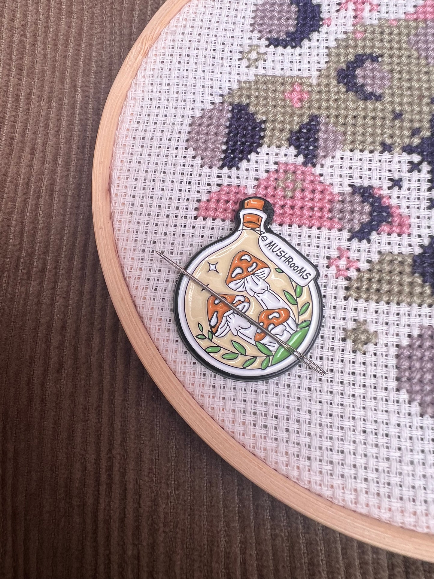 Orange potion magnetic needle minder