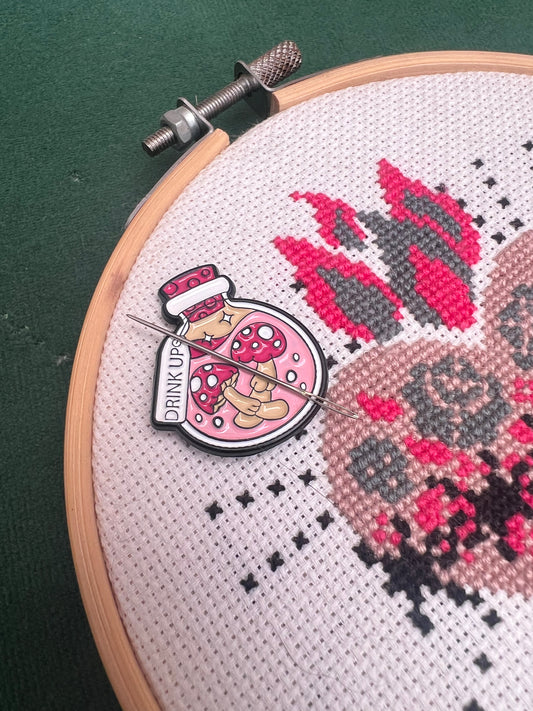 Pink potion magnetic needle minder