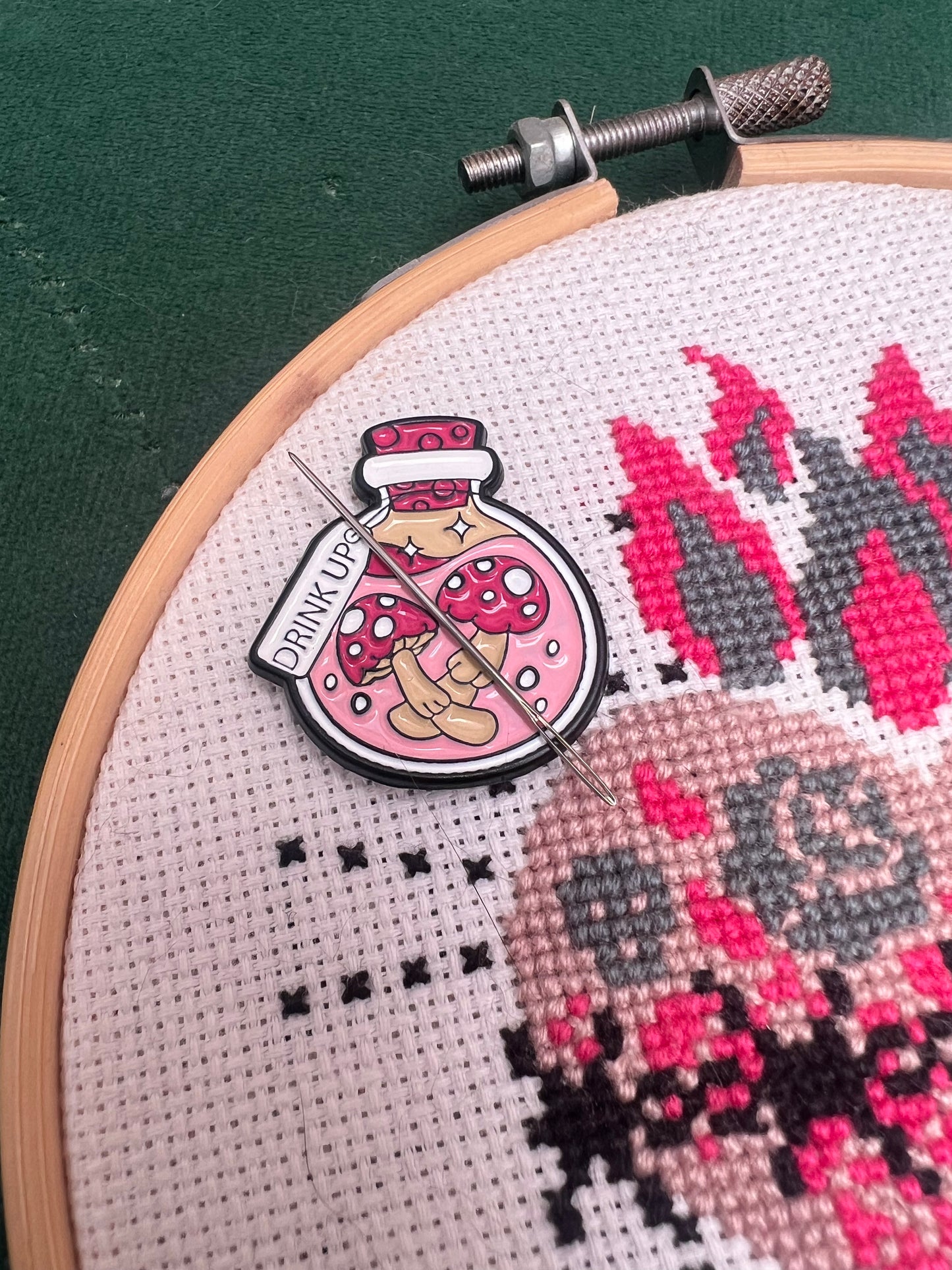 Pink potion magnetic needle minder