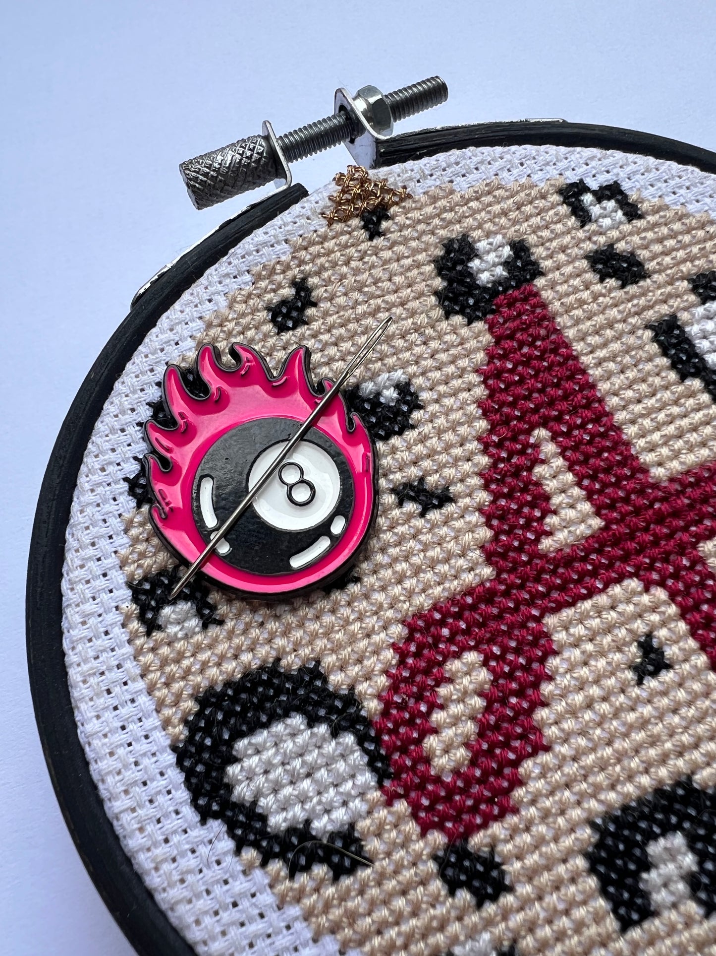 Flaming 8 ball magnetic needle minder