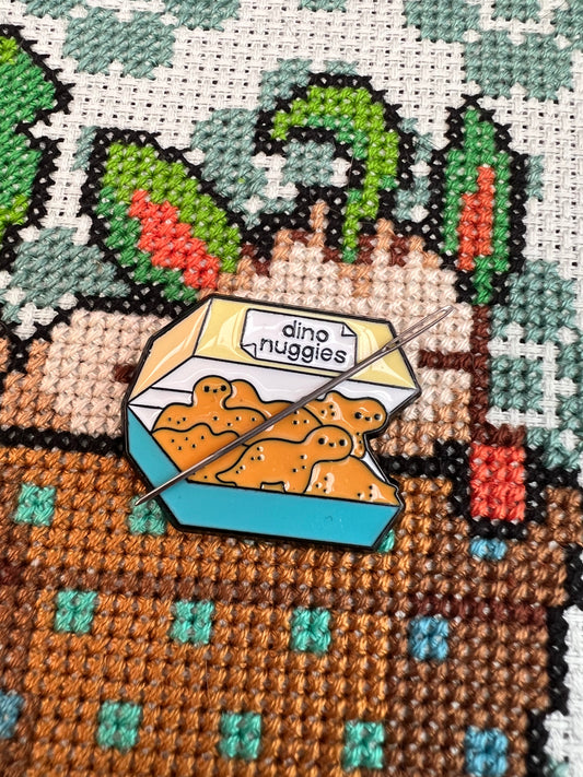 Dino Nuggies magnetic needle minder
