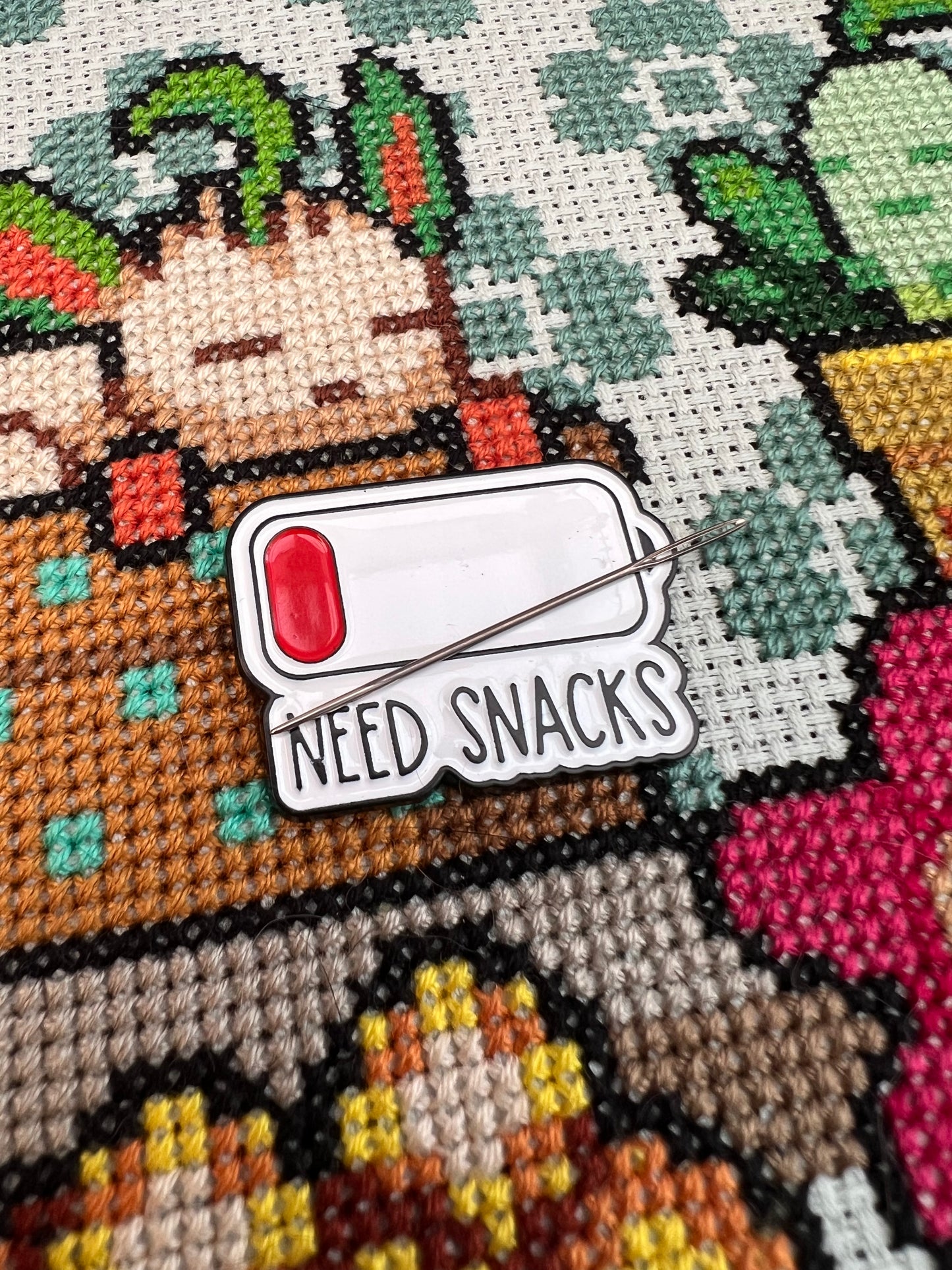 Need Snacks magnetic needle minder